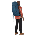 Carried view of the Osprey Kestrel 48 Hydration Bag in Blue colourway, men model