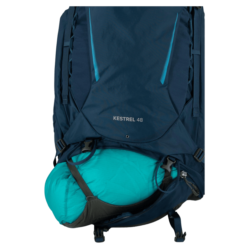 Feature view of the Osprey Kestrel 48 Hydration Bag in Blue colourway, men model