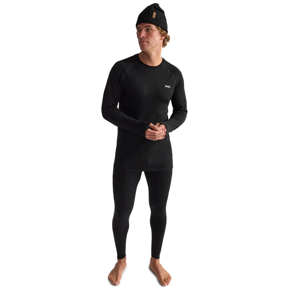 Fully body view of men wearing Oyuki 2026 Merino Thermal Longsleeve in black