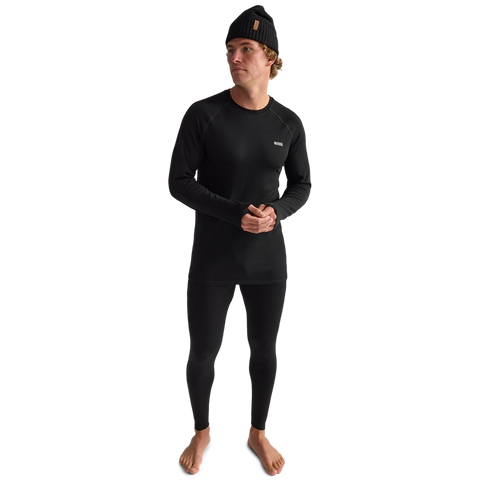 Fully body view of men wearing Oyuki 2026 Merino Thermal Longsleeve in black