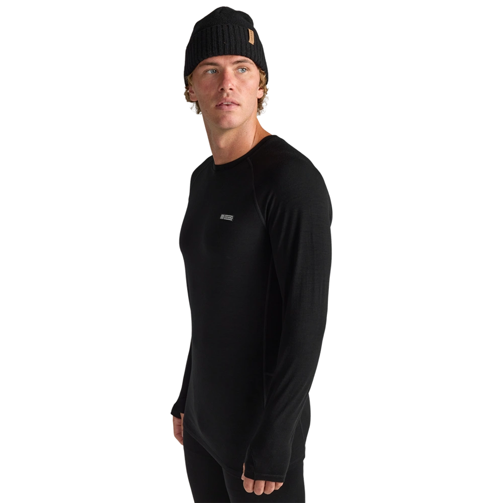 Side view of men wearing Oyuki 2026 Merino Thermal Longsleeve in black