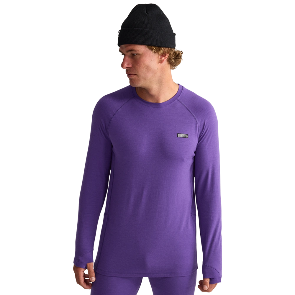Front view of men wearing Oyuki 2026 Merino Thermal Longsleeve in cyber purple