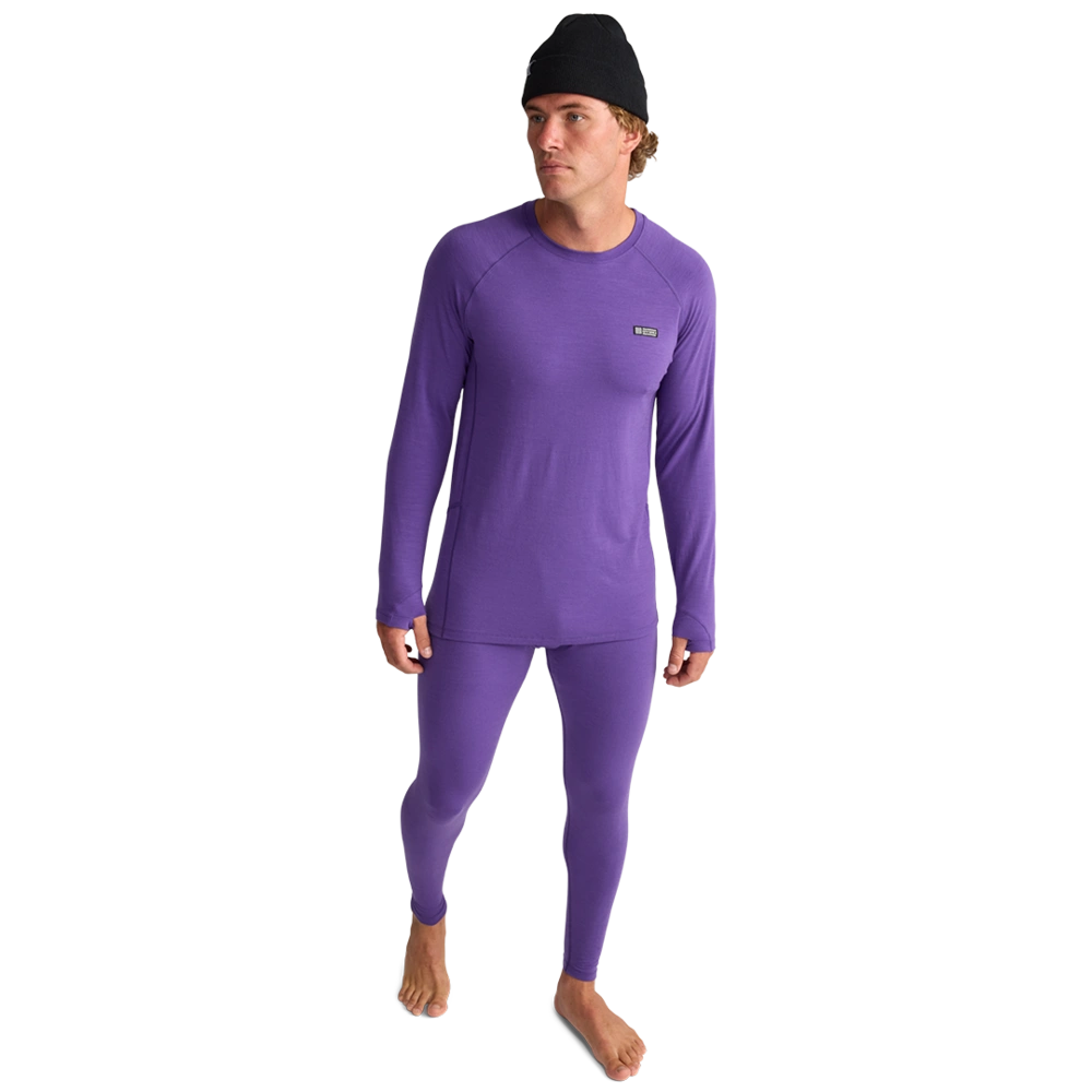 Full body view of men wearing Oyuki 2026 Merino Thermal Longsleeve in cyber purple