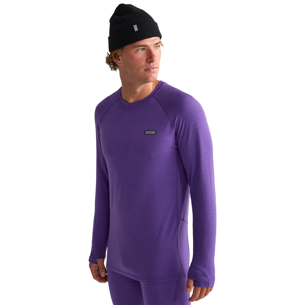 Side view of men wearing Oyuki 2026 Merino Thermal Longsleeve in cyber purple