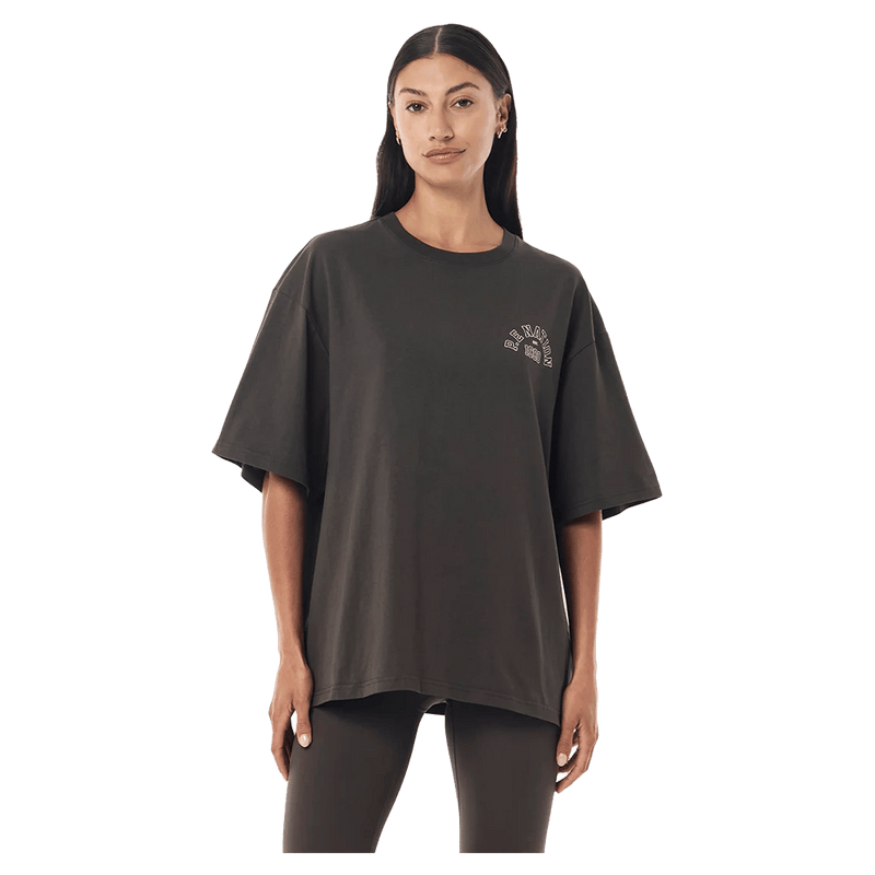 Front view of the P.E Nation Established Tee in Dark Olive colourway, women model