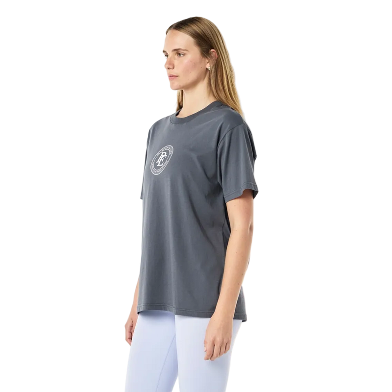 Side view of the P.E Nation Pulse Tee in Thunder colourway, women's model