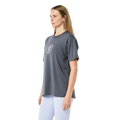 Side view of the P.E Nation Pulse Tee in Thunder colourway, women's model