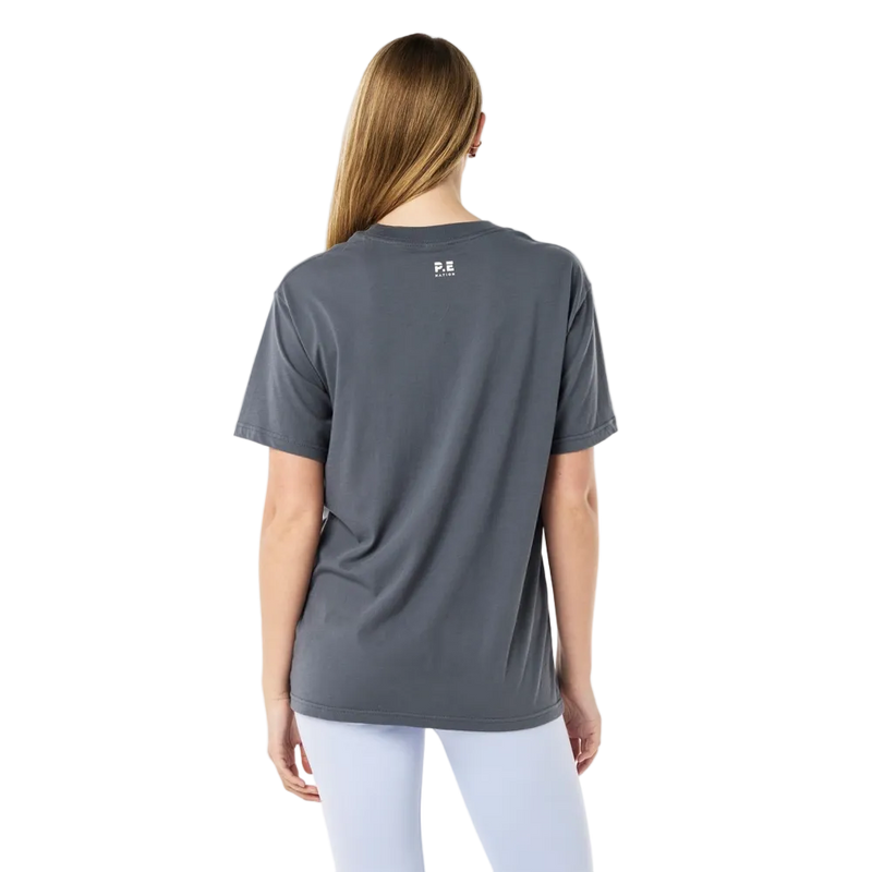 Back view of the P.E Nation Pulse Tee in Thunder colourway, women's model