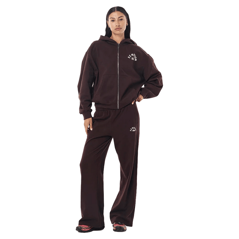 Main view of the PE NATION Established Zip Thru Hoodie Mahogany Jumper,  26/27 Womens's model