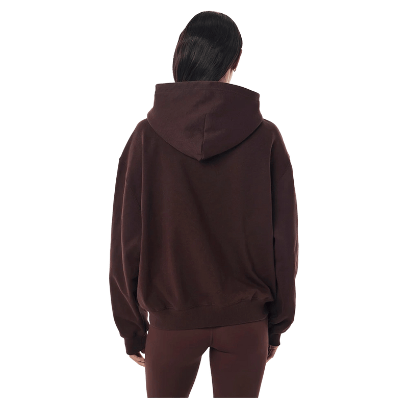 Back view of the PE NATION Established Zip Thru Hoodie Mahogany Jumper,  26/27 Womens's model