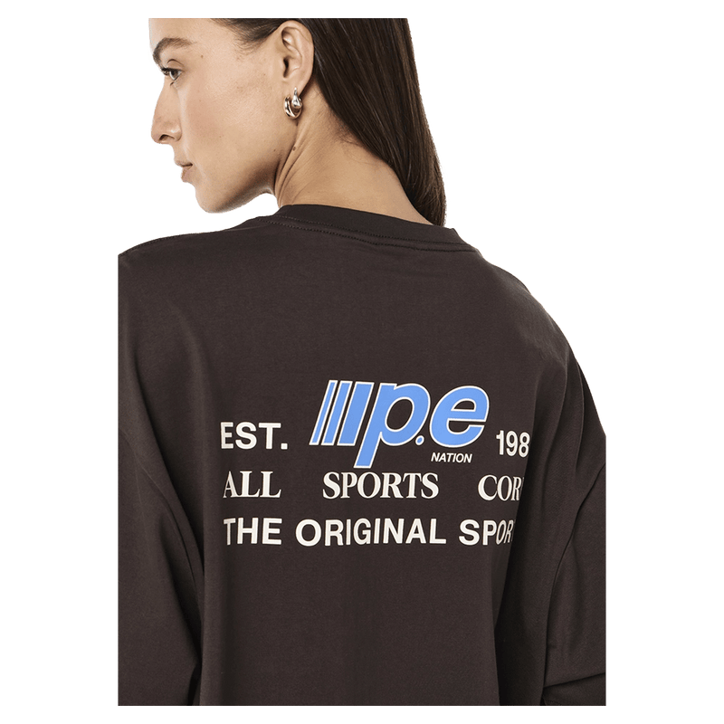 Back side view of the PE NATION Glide Oversized Tee Coffee Tee,  26/27 Womens's model