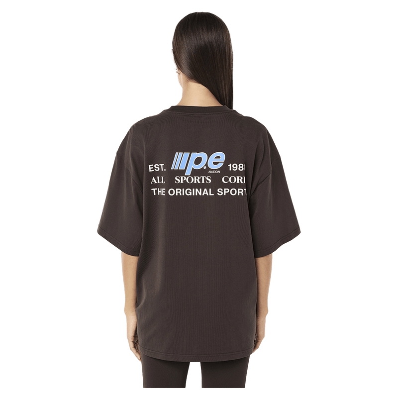 Back view of the PE NATION Glide Oversized Tee Coffee Tee,  26/27 Womens's model