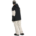 Rear, on-body image of the Primry Snowboard Jacket in Black. Two-tone colourway split with contrast Stone White across the elbows.  