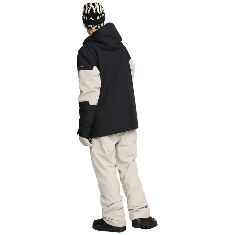 Rear, on-body image of the Primry Snowboard Jacket in Black. Two-tone colourway split with contrast Stone White across the elbows.  