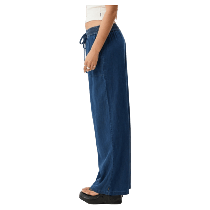 Side view of Afends Palmer Wide Leg Pants - Womens in colour Ink.