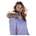 Woman wearing a lavender Pure Aspen ski jacket with a brown faux fur hood trim.