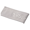 White raised cursive Resolve logo on a light grey stitched fabric panel of the Sprinter Baggy cargo Ski Pants.