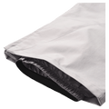 Close-up of white Resolve Sprinter ski pants showing the bottom leg opening and internal elasticated snow gaiter in colour Grey