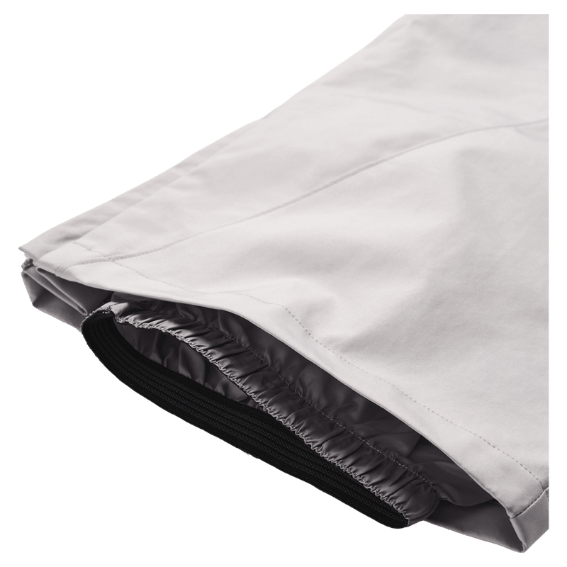 Close-up of white Resolve Sprinter ski pants showing the bottom leg opening and internal elasticated snow gaiter in colour Grey