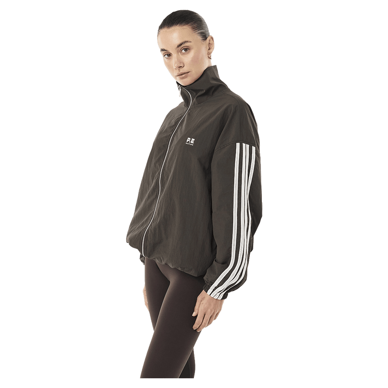 Side view of P.E Nation Radius Jacket - Womens in colour Coffee.