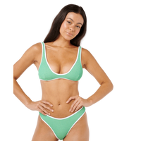 Lifestyle image of the Rip Curl Luxe Surf Bralette in Irish Green