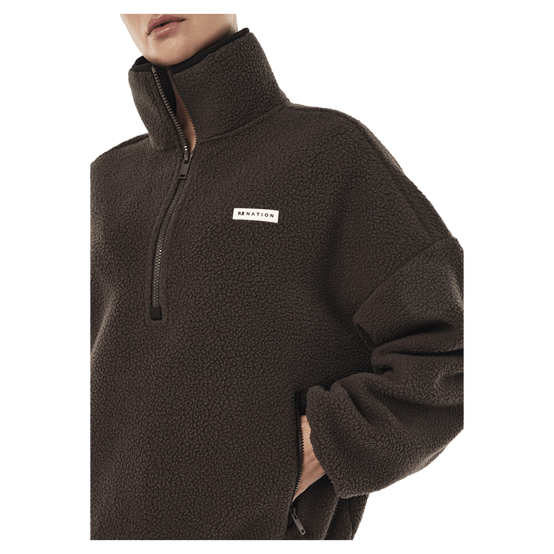 Close view of P.E Nation Rotate Quarter Zip - Womens in colour Coffee.