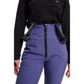 Front close view of women wearing theRojo Softshell High Rise Ski Pants - Womens in colour Skipper Blue