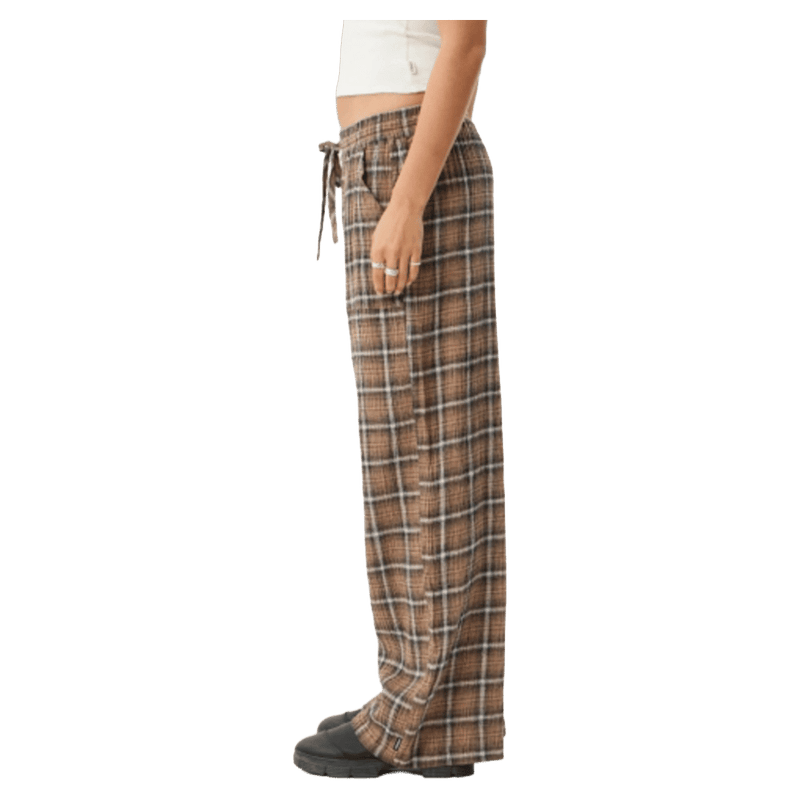 Side view of Afends Reverie Hemp Seersucker Pants - Womens in colour Coffee Check.
