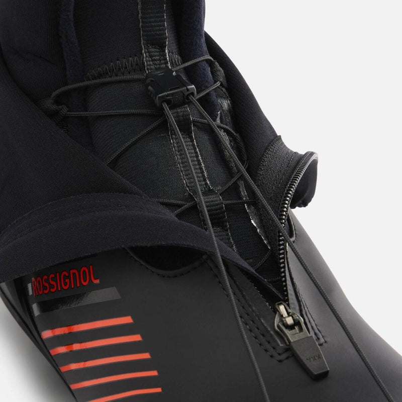 close up view of the Rossignol X-9 Skate Boot lace pull and zipper