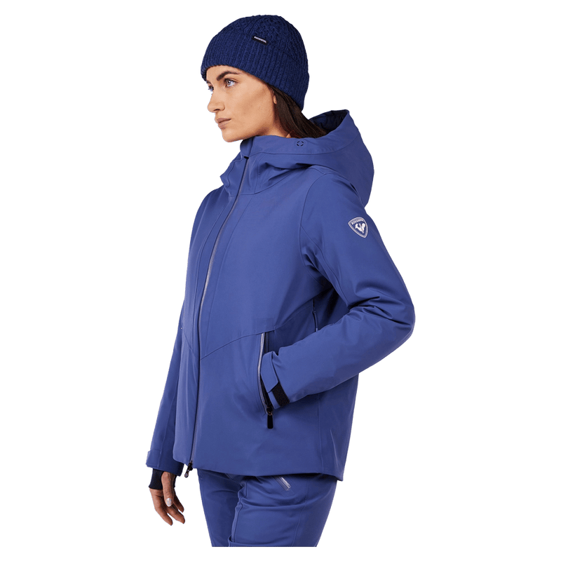 Side view of the Rossignol BLACKSIDE Jacket in FUTURE BLUE colourway, women model