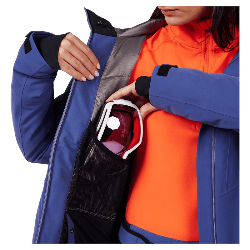 Goggle pocket view of the Rossignol BLACKSIDE Jacket in FUTURE BLUE colourway, women model