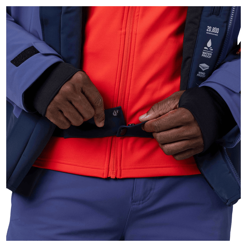 Powder skirt view of the Rossignol Blackside 2.0 Jacket in FUTURE BLUE colourway, men model