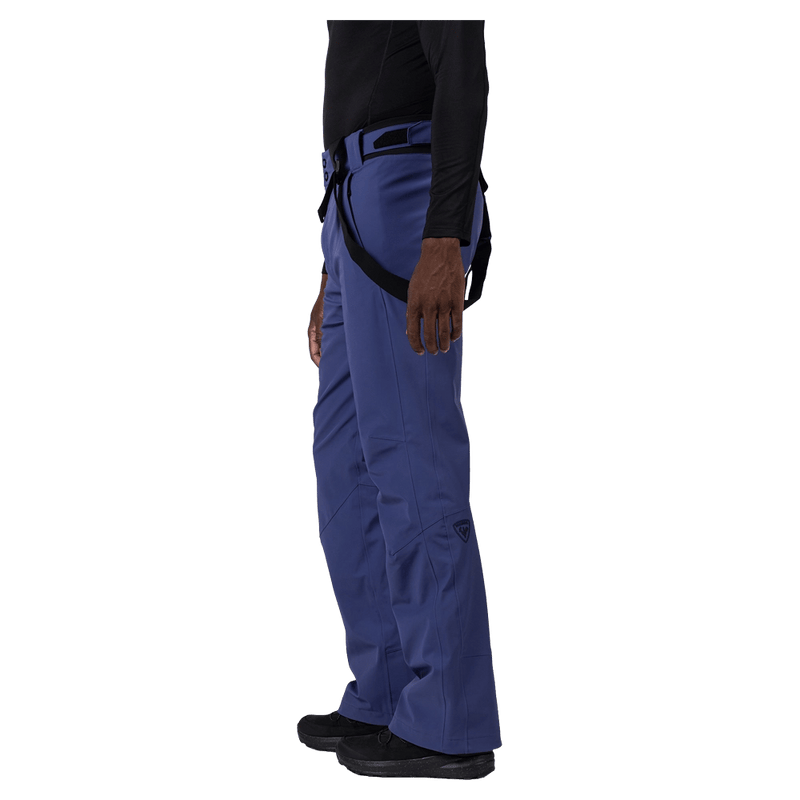 Side view of the Rossignol Blackside 2.0 Pants in FUTURE BLUE colourway, men model