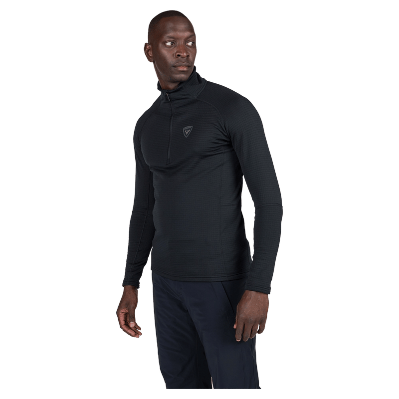 Side view of the Rossignol Blackside Half-Zip Fleece Top in Black colourway, men model