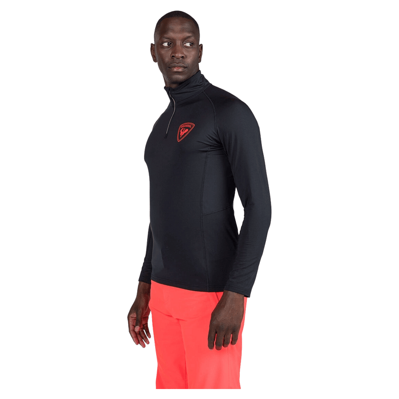 Side view of the Rossignol CLASSIQUE 1/2 ZIP Baselayer in Black colourway, men model