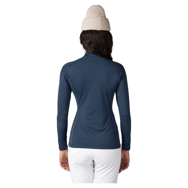 Back view of the Rossignol CLASSIQUE Half ZIP Baselayer in DARK NAVY colourway, women model
