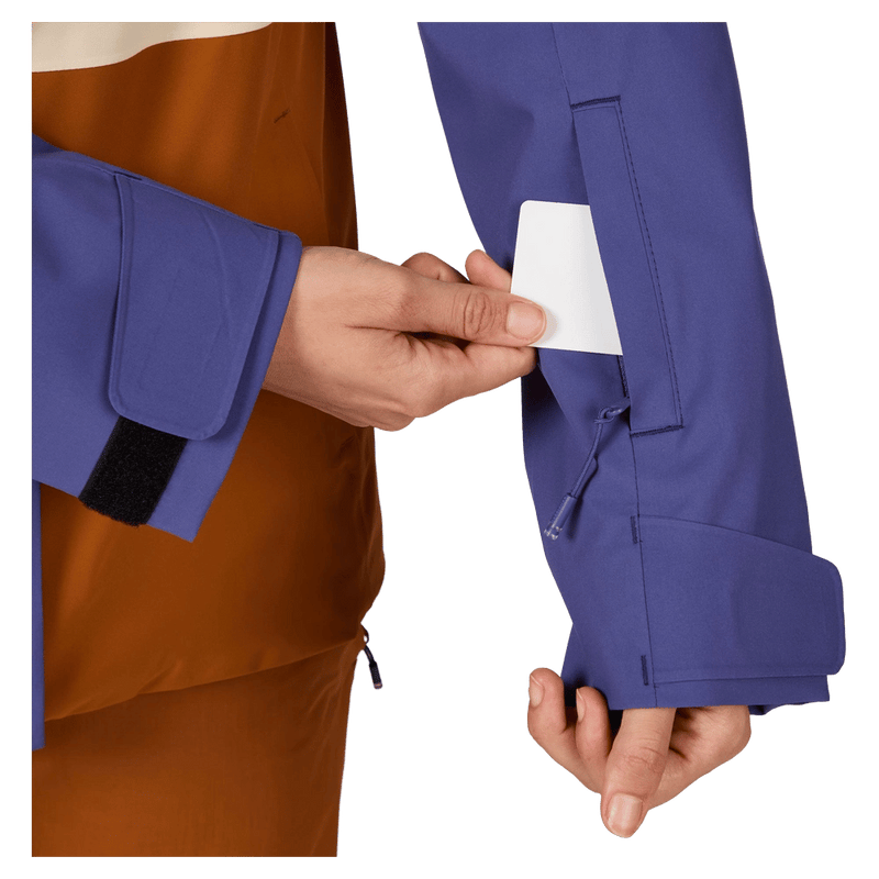Pass pocket view of the Rossignol Desafio Shell 2L Ski Jacket in FUTURE BLUE colourway, women model