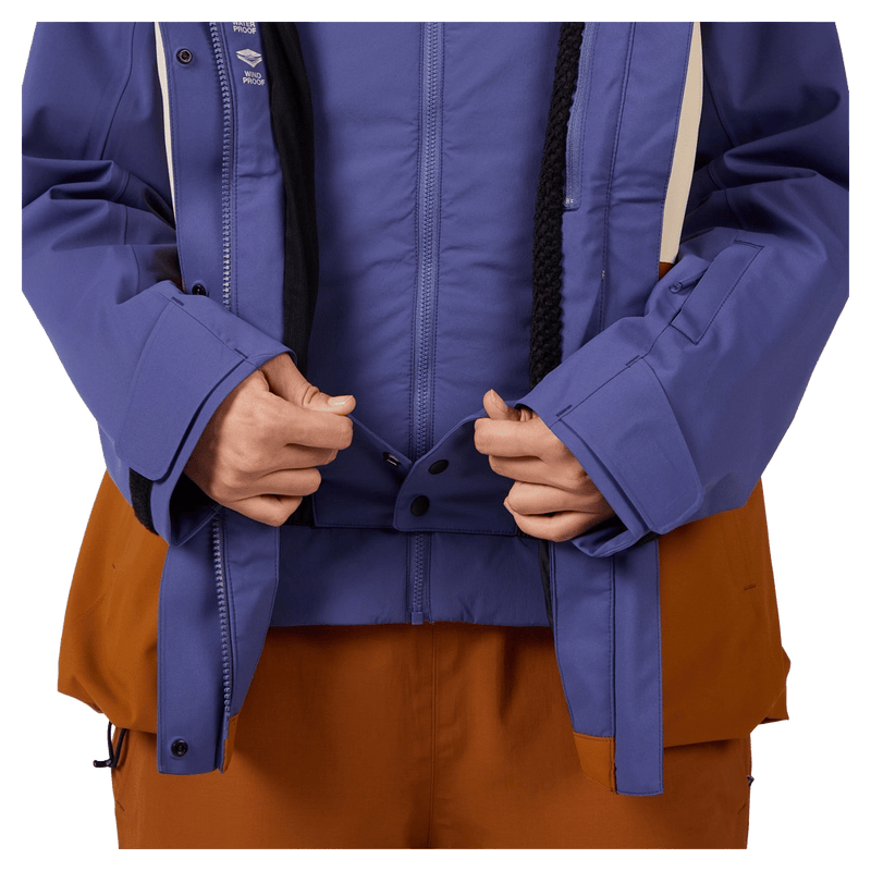 Powder skirt view of the Rossignol Desafio Shell 2L Ski Jacket in FUTURE BLUE colourway, women model