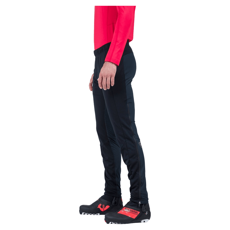Side view of the Rossignol Genetys Pants in Black colourway, unisex model