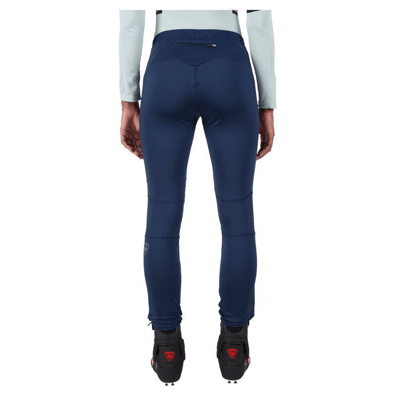 Back view of the Rossignol Genetys Pants in Dark Navy colourway, women model