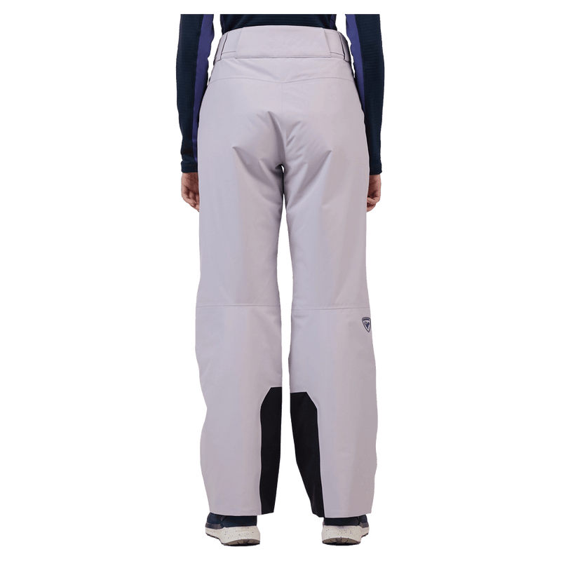 Back view of the Rossignol Insulated Ski Pants in GALACTIC LILAC colourway, women model