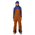 Front view of the Rossignol Outerlimits Insulated Bib in DEEP CARAMEL colourway, women model