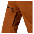 Vents view of the Rossignol Outerlimits Insulated Bib in DEEP CARAMEL colourway, women model