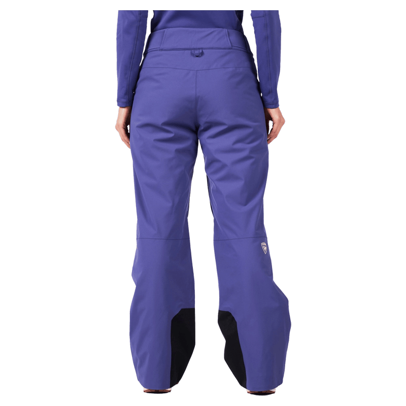 Back view of the Rossignol Outerlimits Insulated Ski Pants in FUTURE BLUE colourway, women model