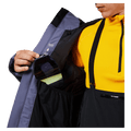 Goggle pocket  view of the Rossignol Rochrun Insulated Jacket in TRUE NIGHT BLUE colourway, men model