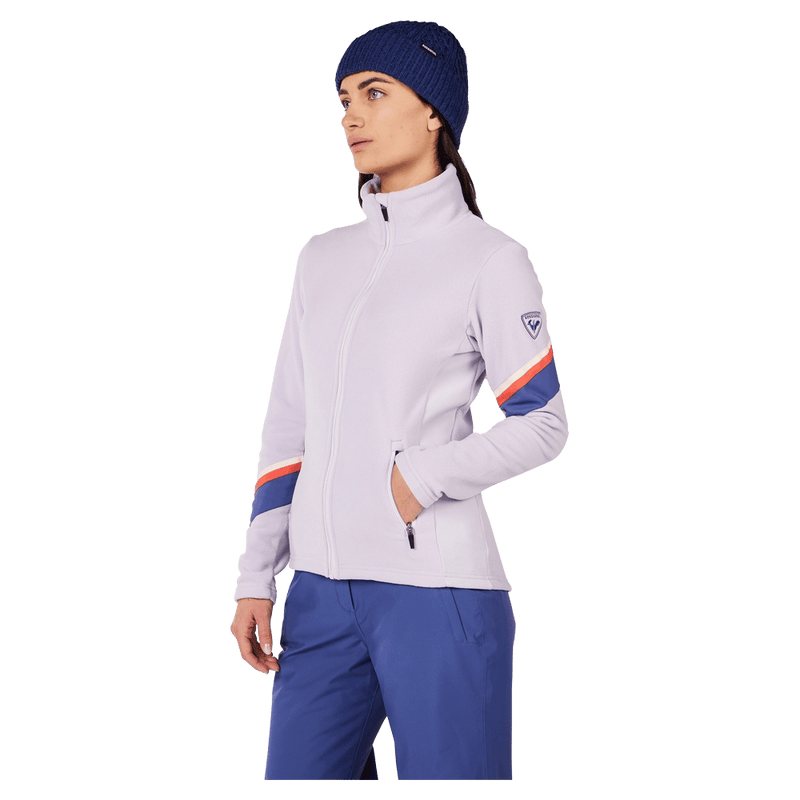Side view of the Rossignol Strawpile Full-Zip Fleece Jacket in GALACTIC LILAC colourway, women model
