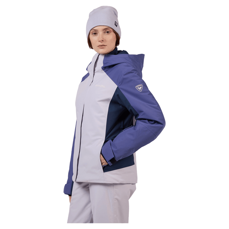 Side view of the Rossignol VELIKA INSULATED Jacket in GALACTIC LILAC colourway, women model