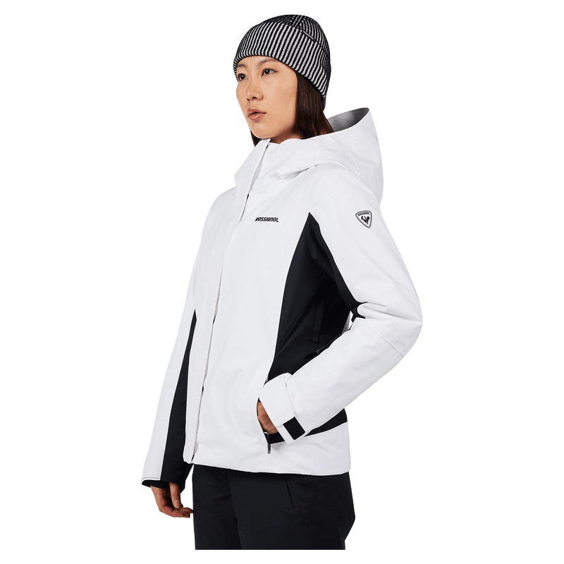 Side view of the Rossignol VELIKA INSULATED Jacket in WHITE colourway, women model