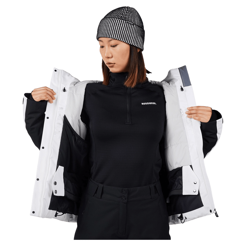 Open jacket view of the Rossignol VELIKA INSULATED Jacket in WHITE colourway, women model
