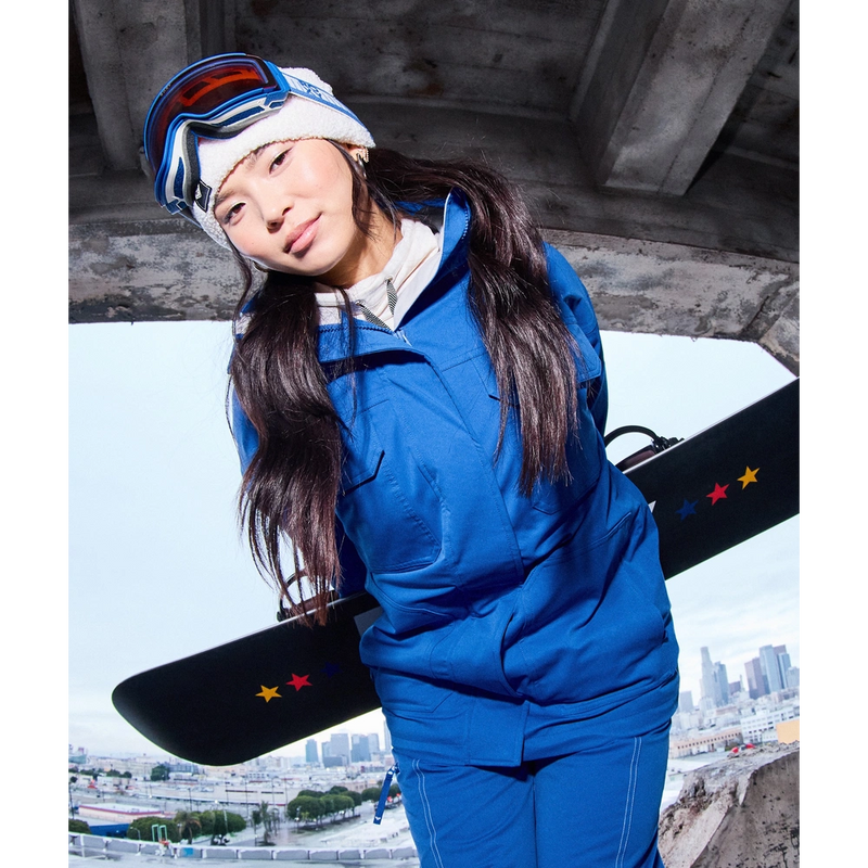 Lifestyle image of the Chloe Kim Snowboard Jacket - Womens in Dazzling Blue